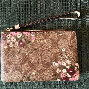 Coach Brown Signature Floral Wristlet with Pink Accents